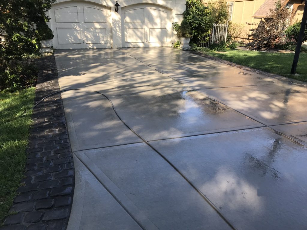 Our Concrete and Driveway Seals Last KCMO Rock Solid Seal